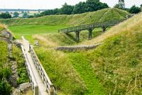 Here you can see the earthwork defensive ditch and banks surrounding the outer bailey