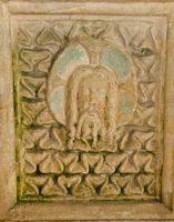 Figure of Christ in Majesty on the font