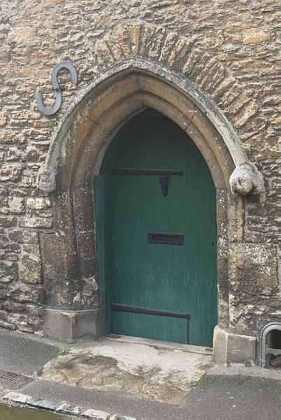 Stock photo of cottage door in Lacock, Wiltshire. Part of the UK Travel and Heritage Image Library from Britain Express, Wiltshire Collection